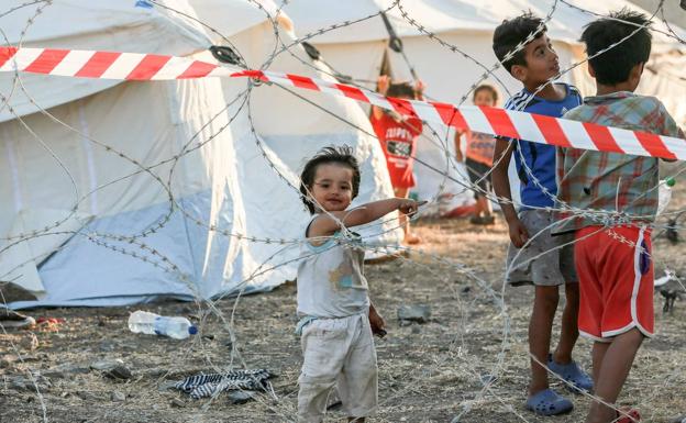 Unos niños en uno de los campos de refugiados. /Afp
